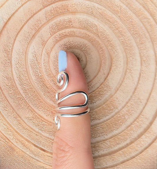 The Peony crochet yarn guide ring splint, handmade by Evergreen Ring Splints