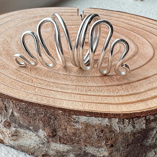 The Willow decorative mallet ring splint, handmade by Evergreen Ring Splints