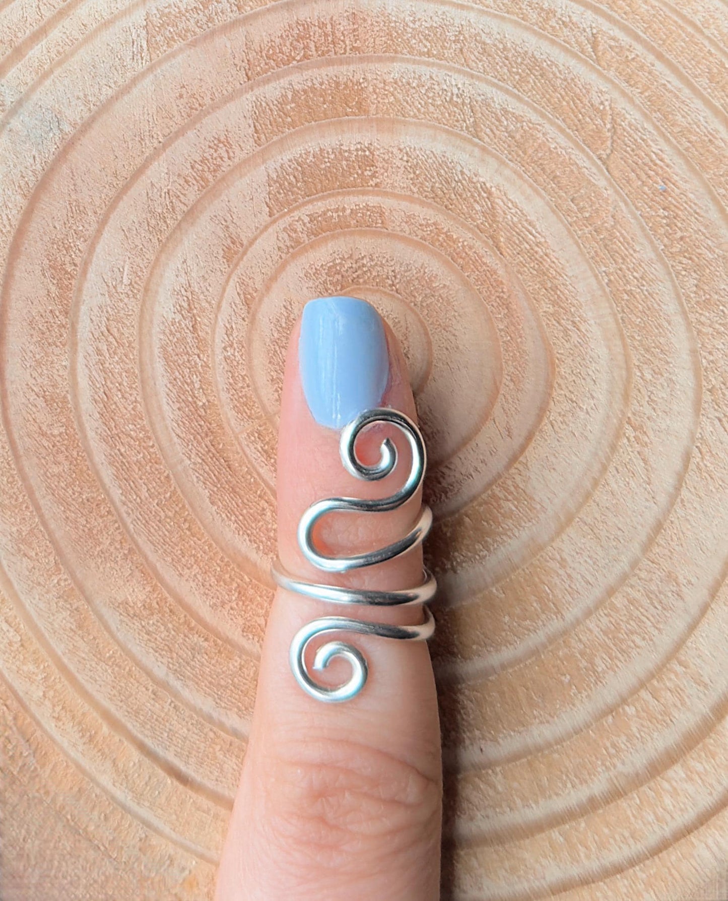 The Peony crochet yarn guide ring splint, handmade by Evergreen Ring Splints