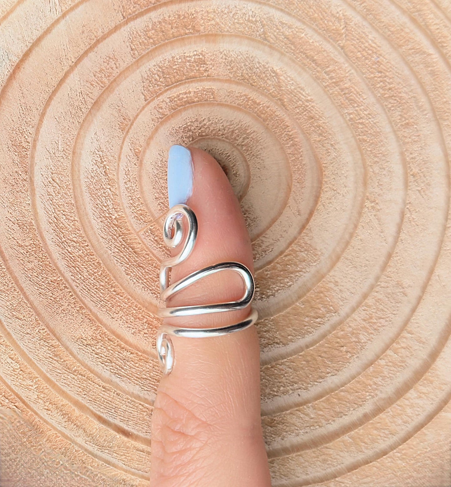 The Peony crochet yarn guide ring splint, handmade by Evergreen Ring Splints