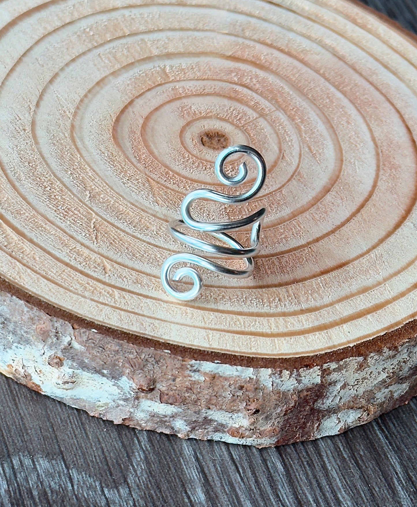 The Peony crochet yarn guide ring splint, handmade by Evergreen Ring Splints