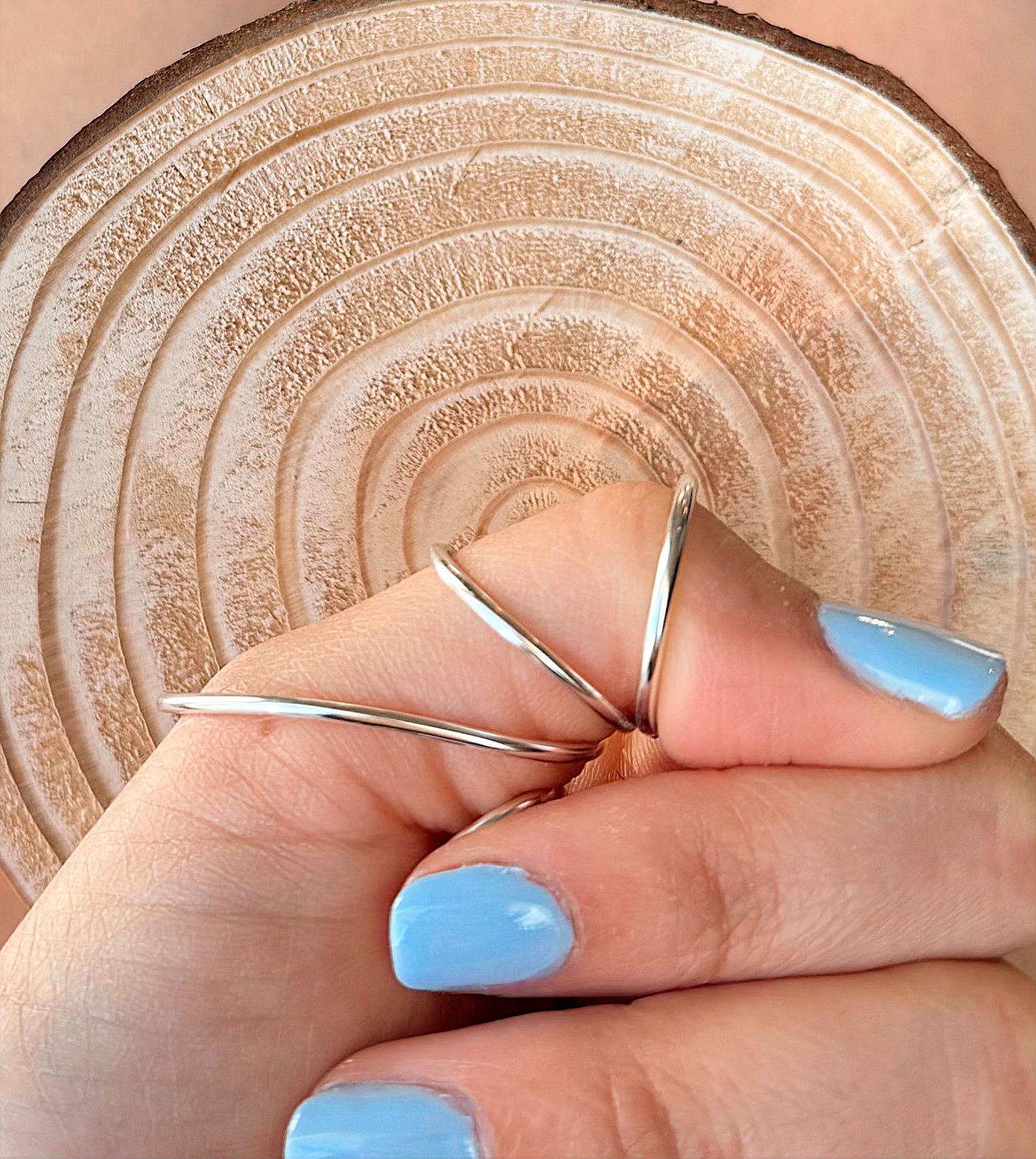 The Oak minimalist MCP thumb ring splint, handmade by Evergreen Ring Splints