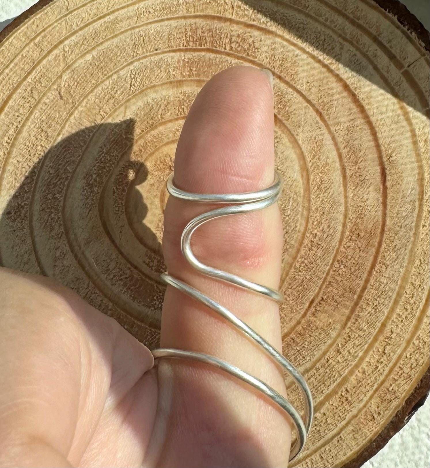 The Lily MCP thumb ring splint, handmade by Evergreen Ring Splints