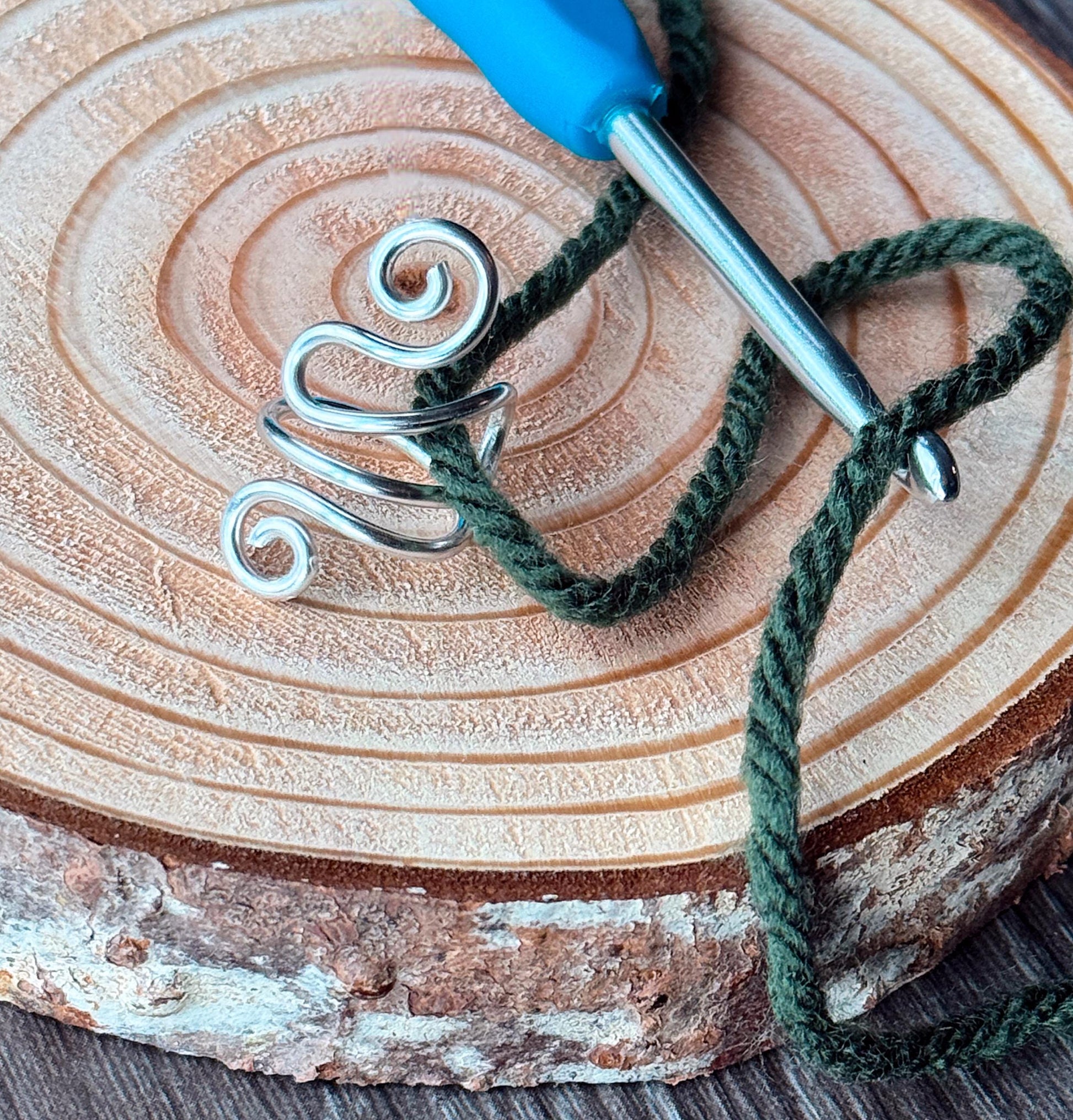 The Peony crochet yarn guide ring splint, handmade by Evergreen Ring Splints