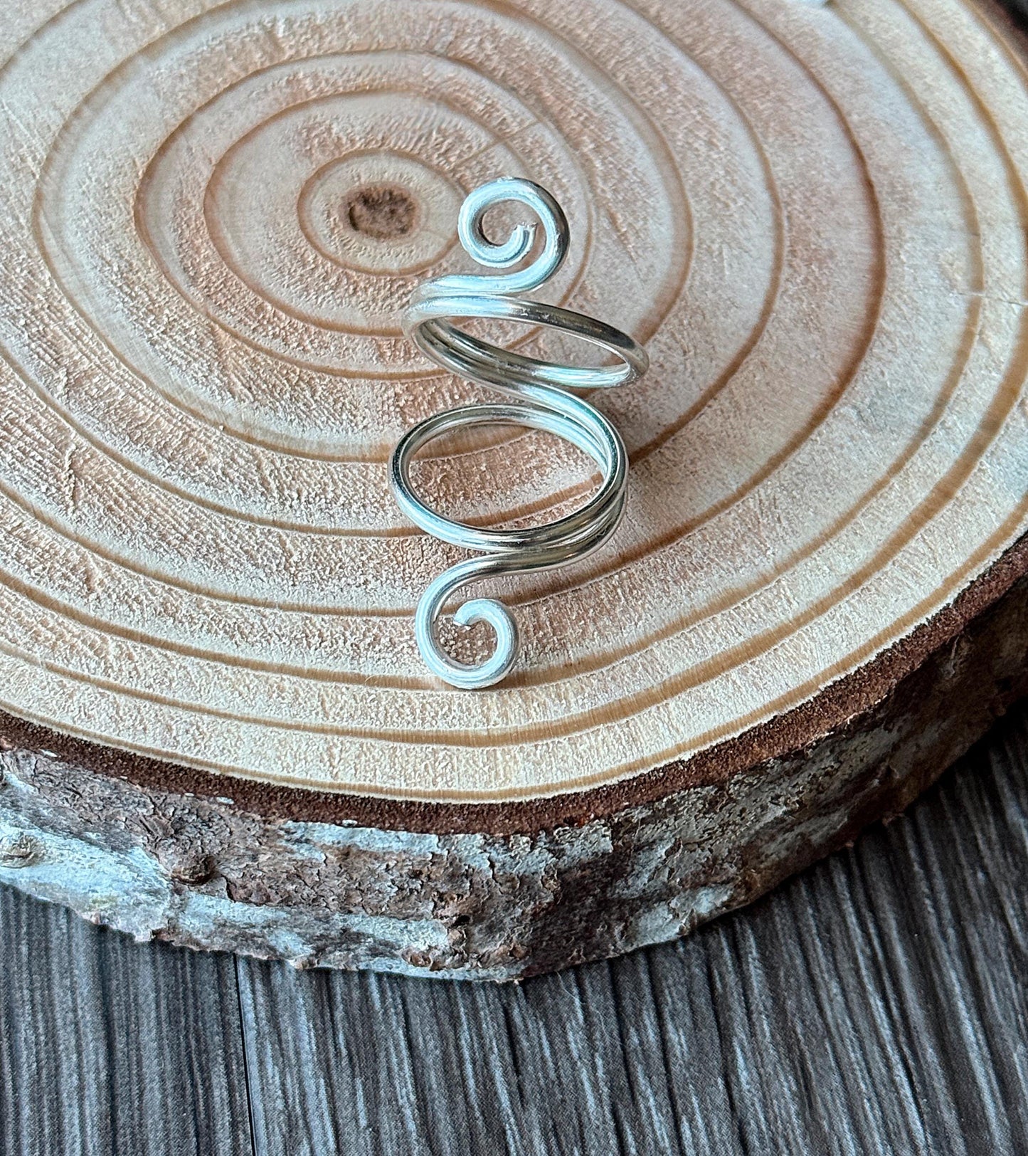 The Elderberry swan neck ring splint, handmade by Evergreen Ring Splints