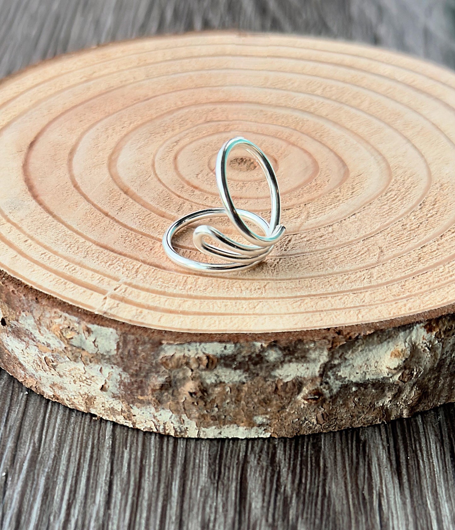 The Cypress lateral deviation and swan neck ring splint, handmade by Evergreen Ring Splints