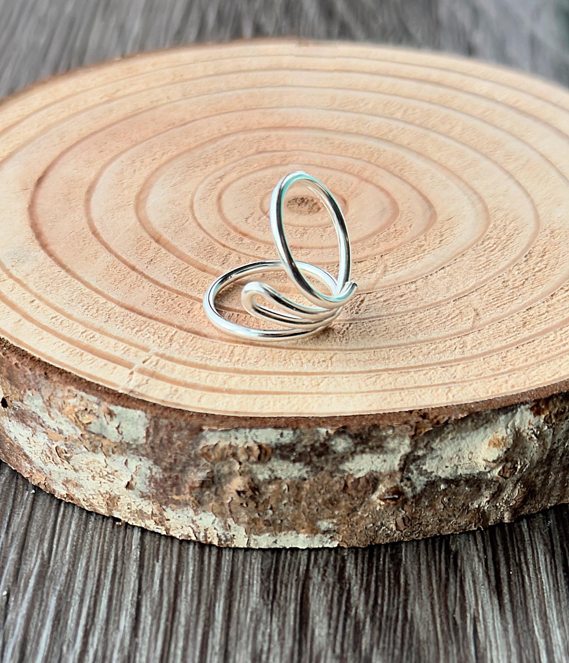 The Cypress lateral deviation and swan neck ring splint, handmade by Evergreen Ring Splints
