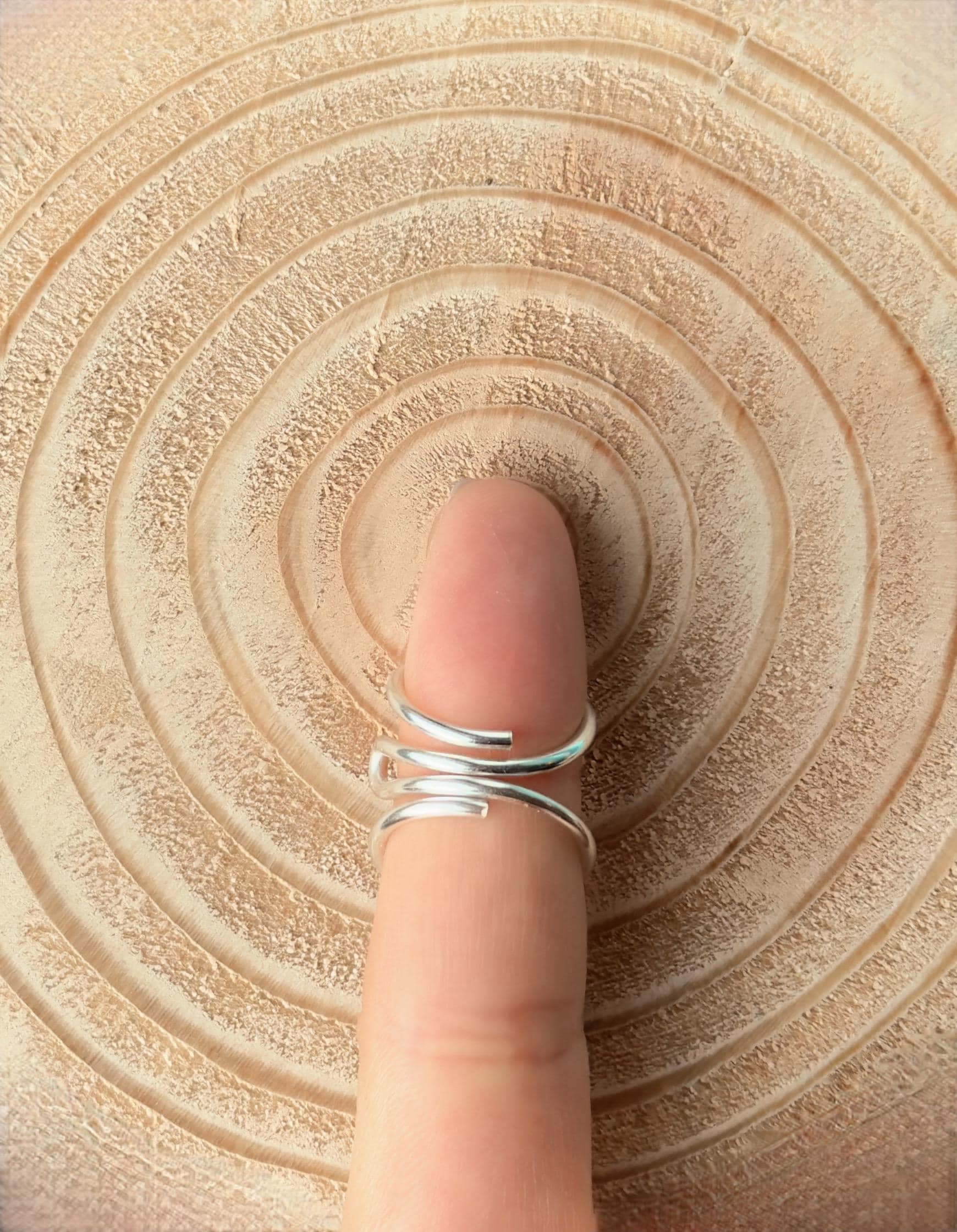 The Cypress lateral deviation and swan neck ring splint, handmade by Evergreen Ring Splints