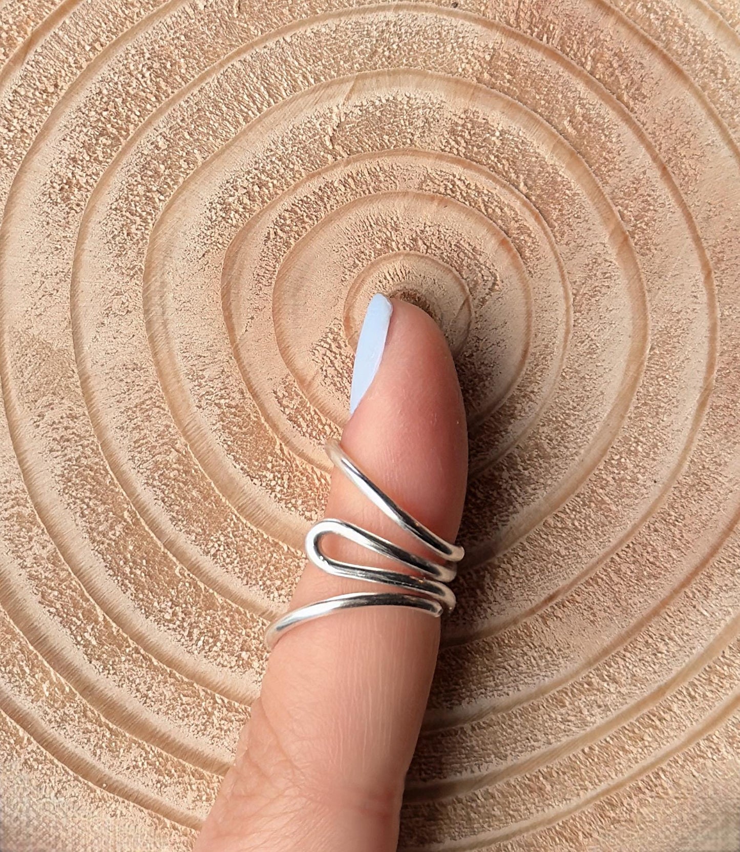 The Cypress lateral deviation and swan neck ring splint, handmade by Evergreen Ring Splints