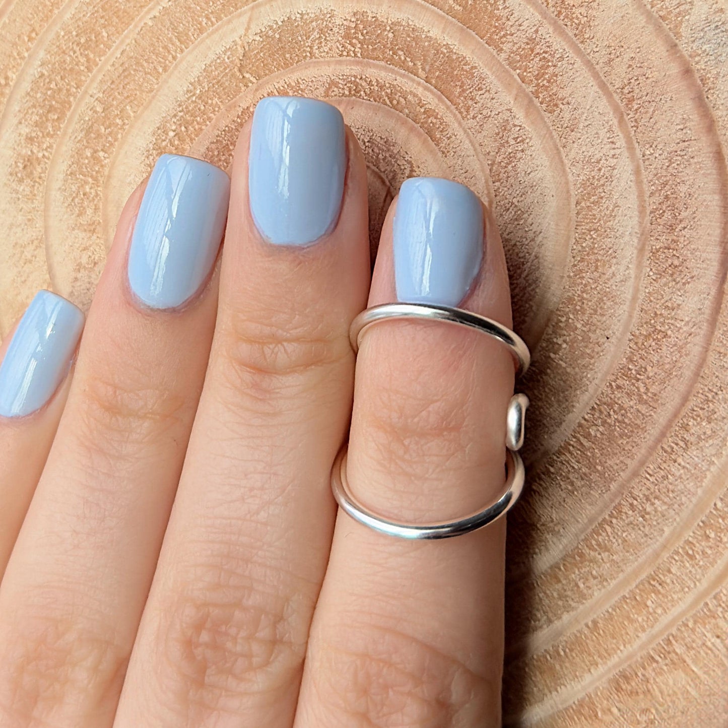 The Cypress lateral deviation and swan neck ring splint, handmade by Evergreen Ring Splints