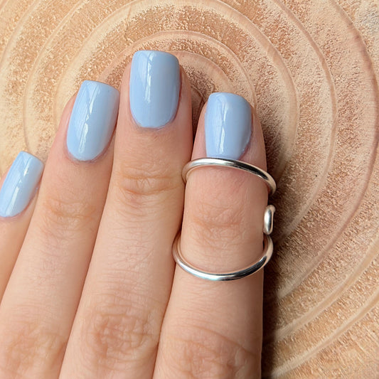 The Cypress lateral deviation and swan neck ring splint, handmade by Evergreen Ring Splints