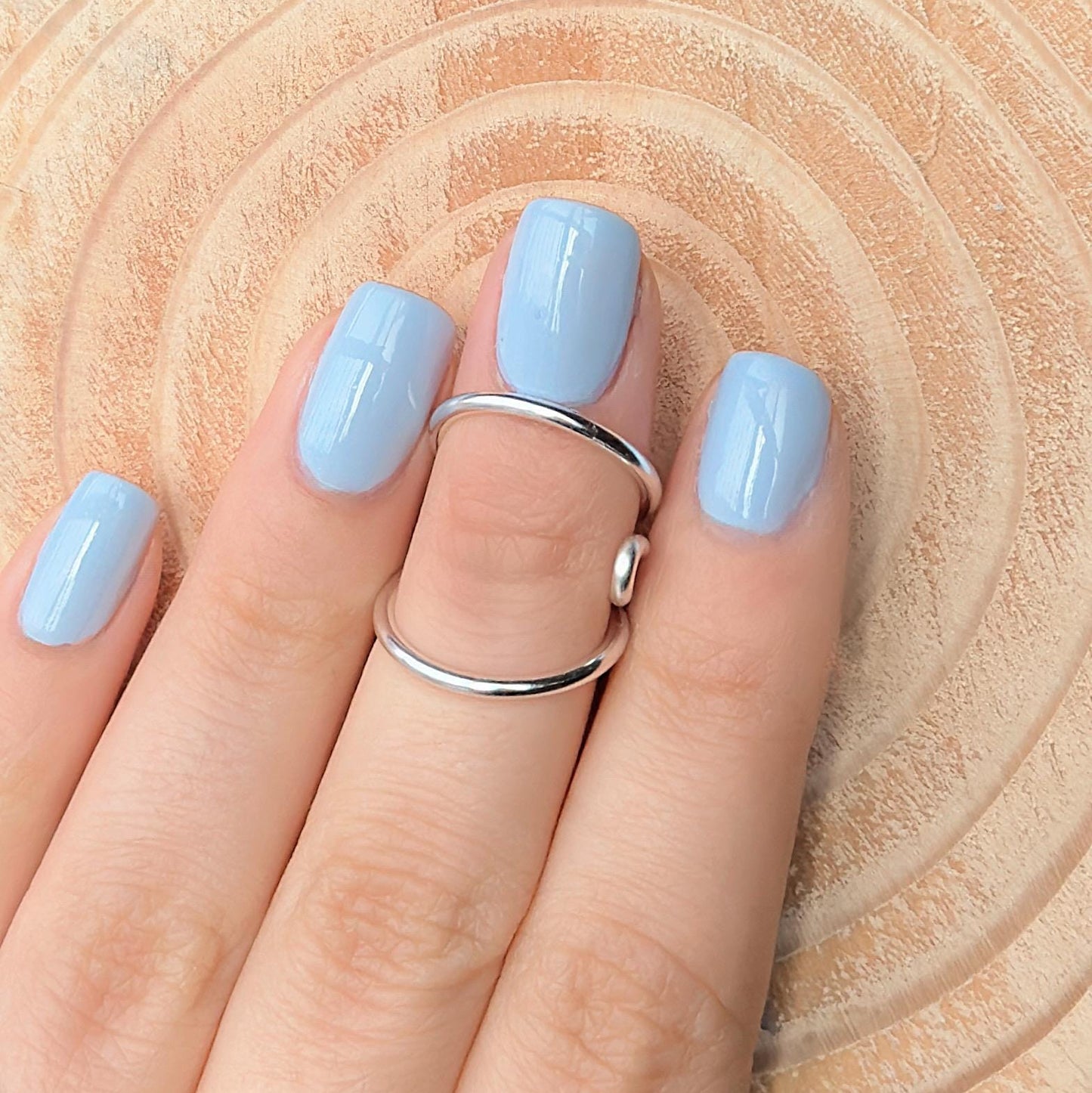 The Cypress lateral deviation and swan neck ring splint, handmade by Evergreen Ring Splints