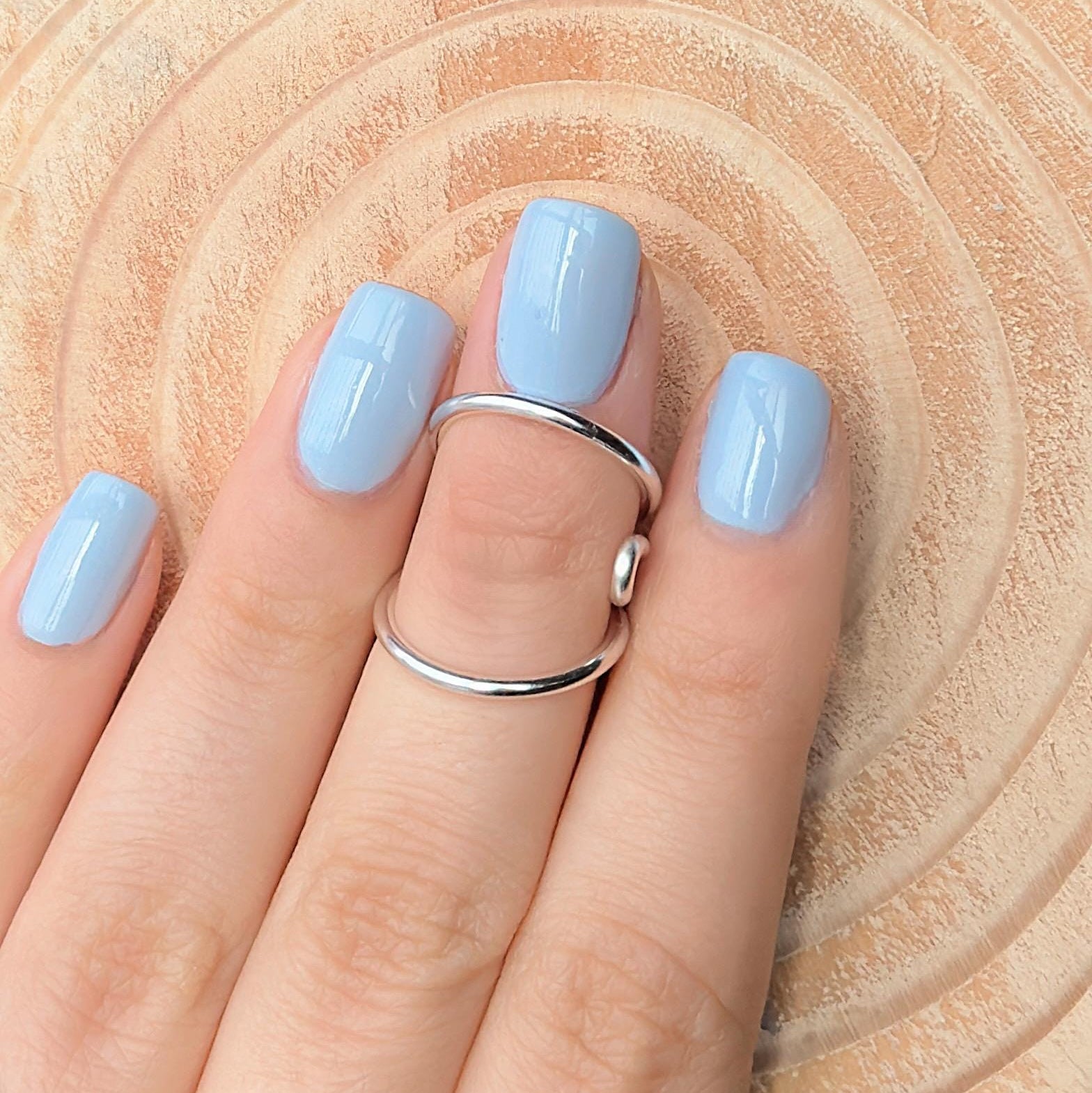 The Cypress lateral deviation and swan neck ring splint, handmade by Evergreen Ring Splints