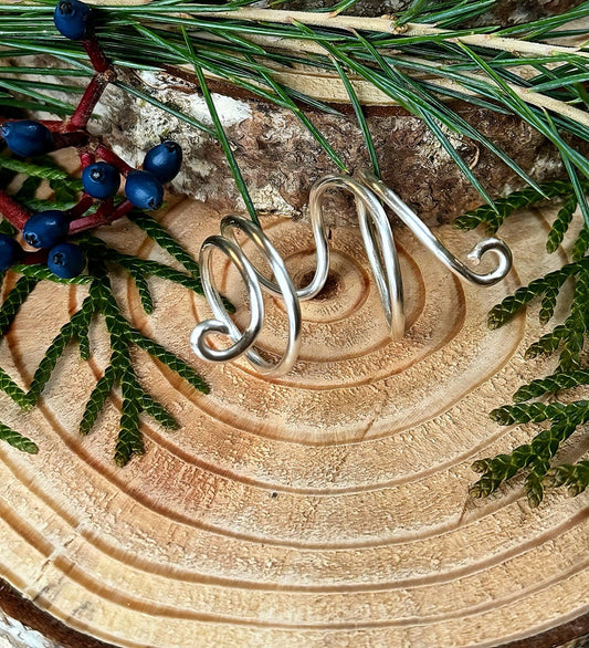 The Azalea thumb ring splint, handmade by Evergreen Ring Splints