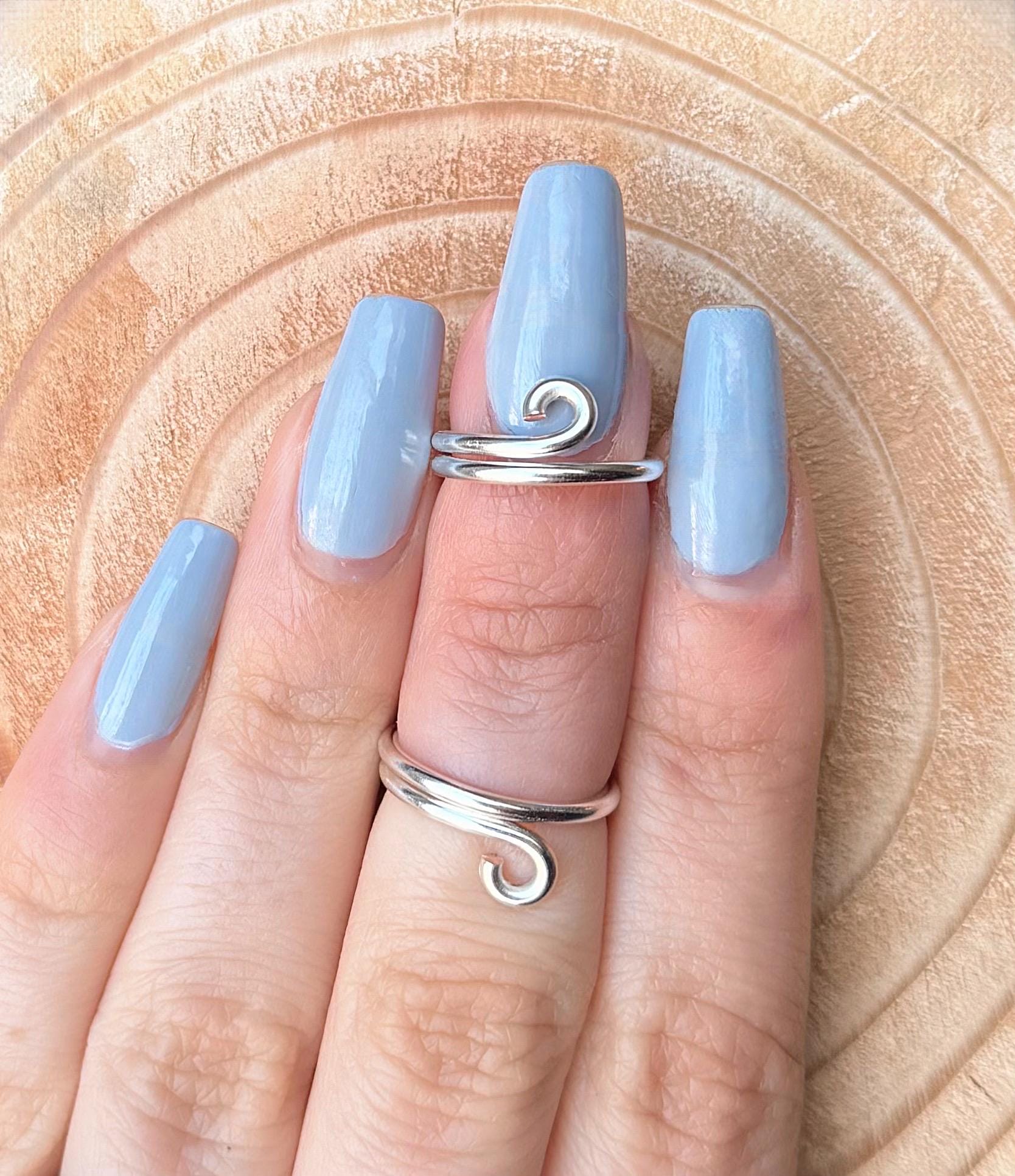 The Lilac extended hypermobility ring splint, handmade by Evergreen Ring Splints