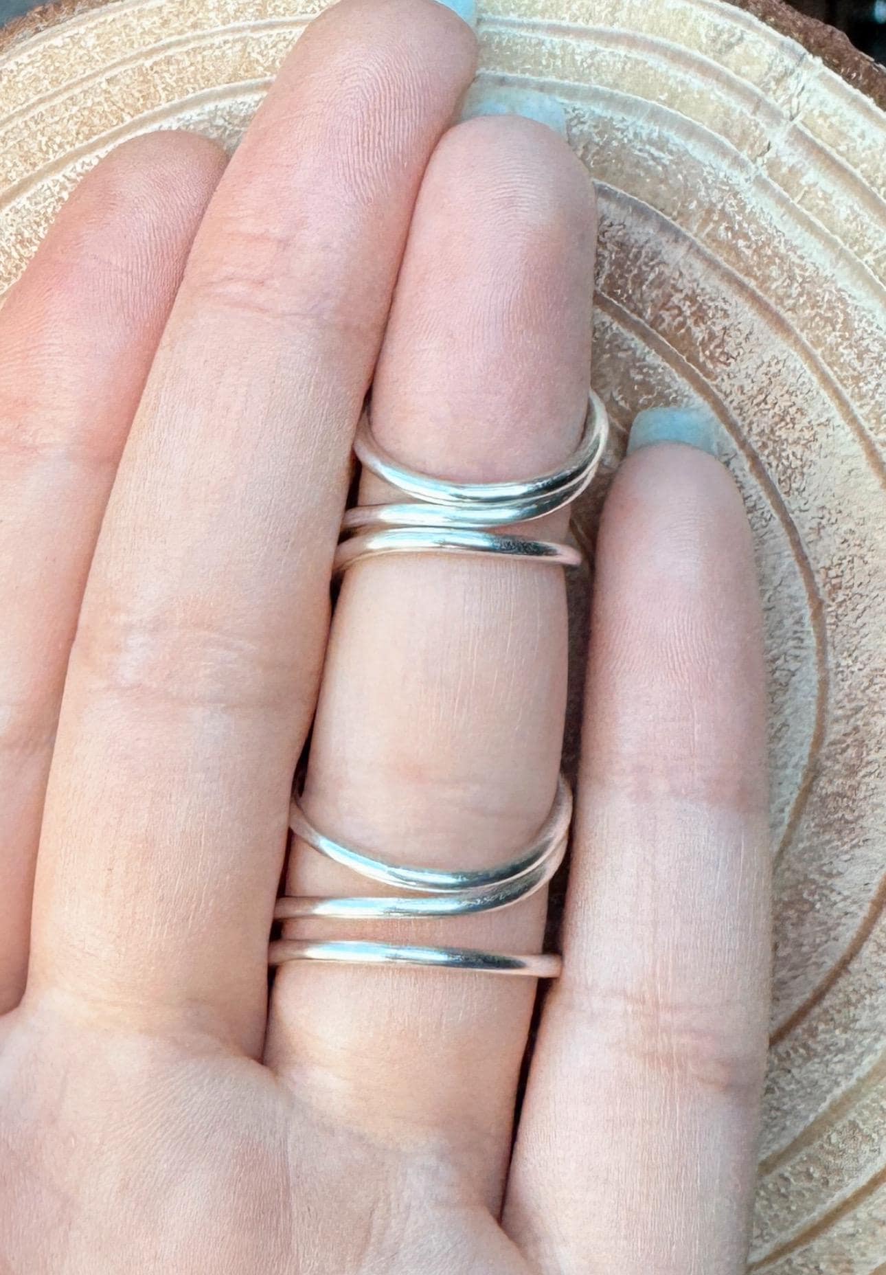 The Magnolia full finger double swan ring splint, handmade by Evergreen Ring Splints