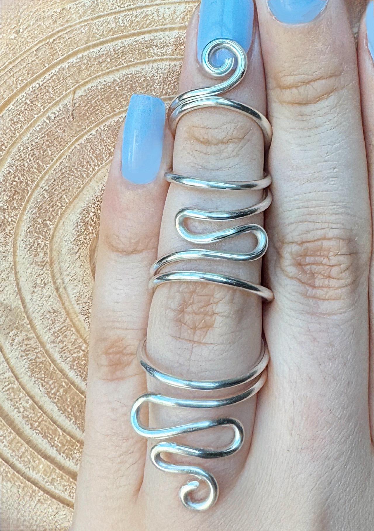 The Magnolia full finger double swan ring splint, handmade by Evergreen Ring Splints