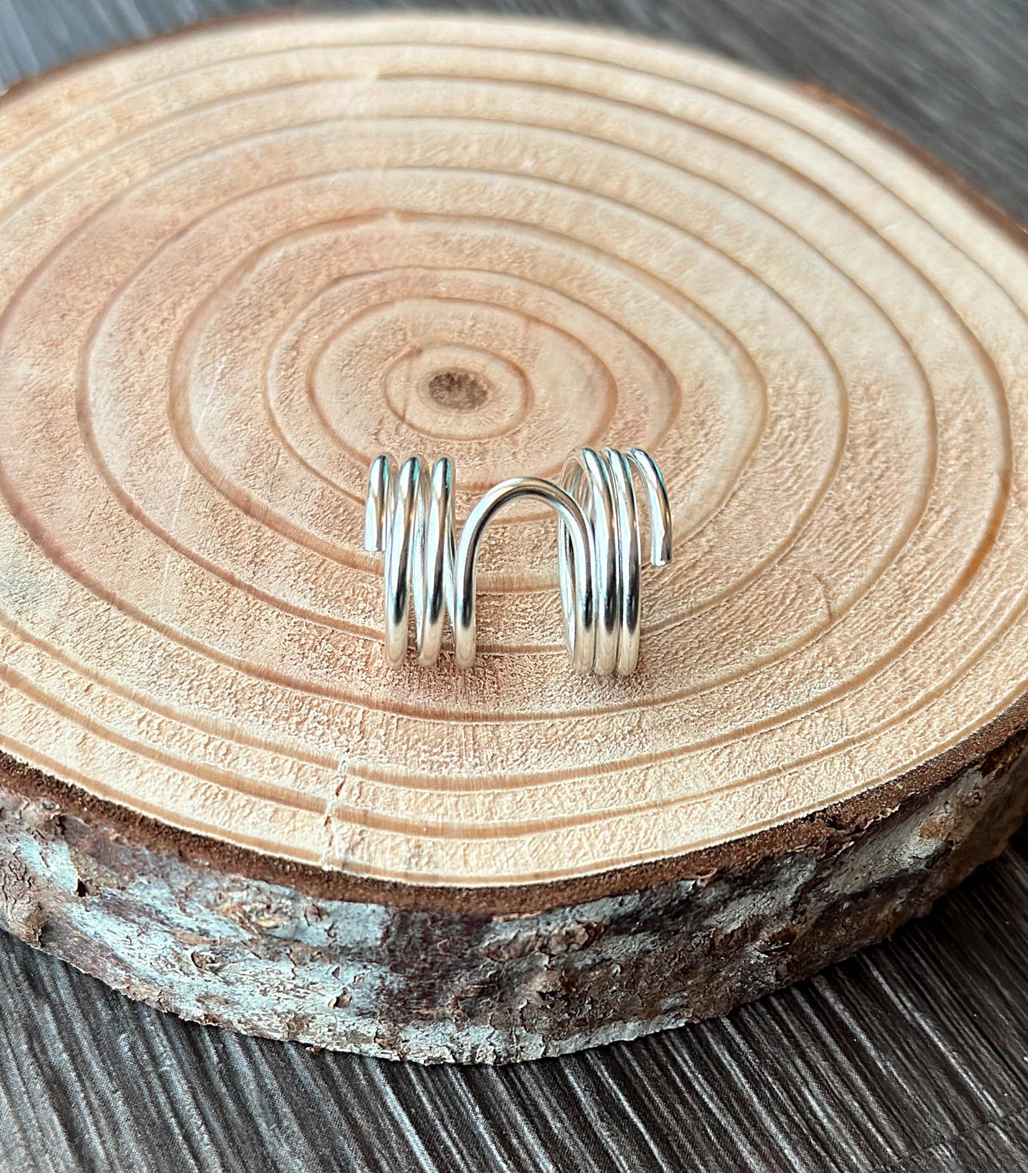 The Pine lateral deviation and mallet ring splint, handmade by Evergreen Ring Splints