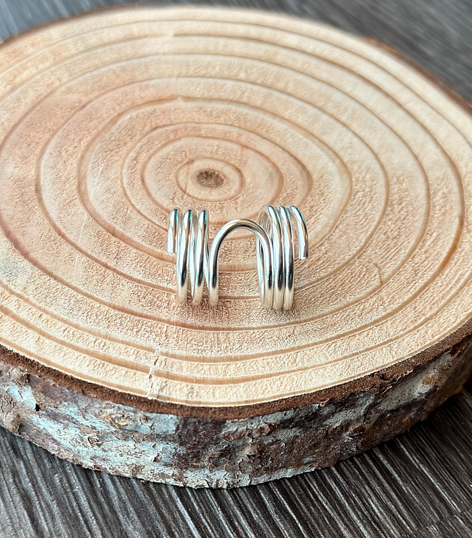 The Pine lateral deviation and mallet ring splint, handmade by Evergreen Ring Splints