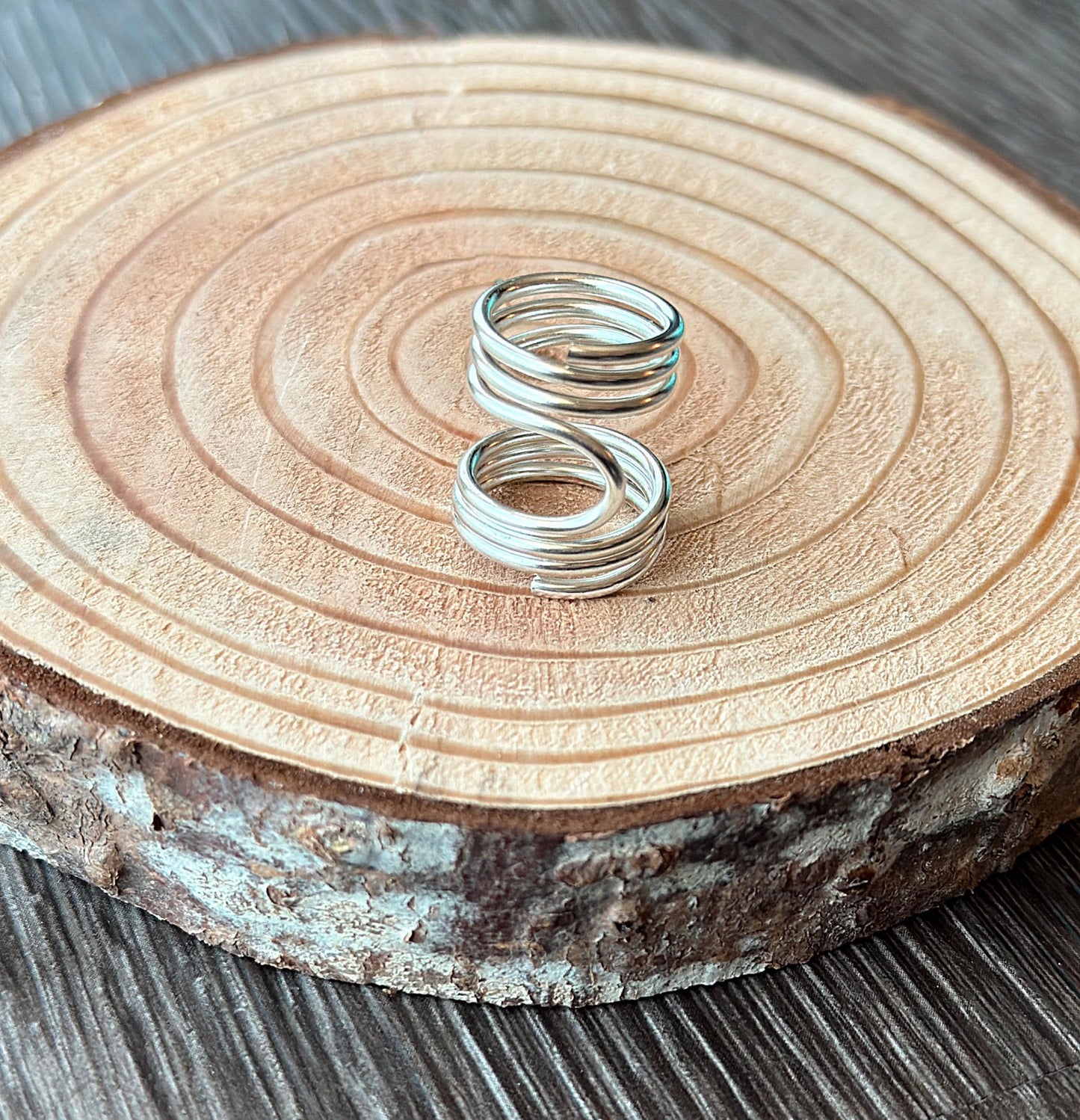 The Pine lateral deviation and mallet ring splint, handmade by Evergreen Ring Splints