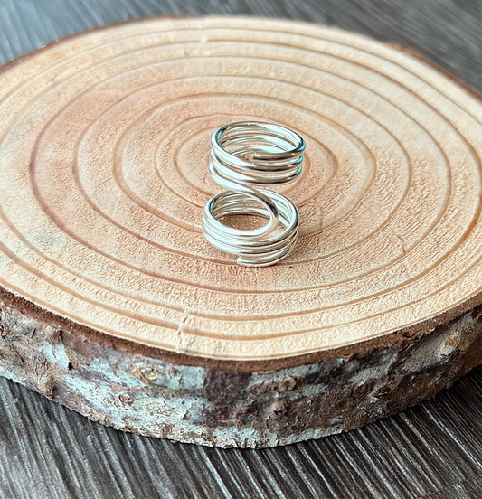 The Pine lateral deviation and mallet ring splint, handmade by Evergreen Ring Splints
