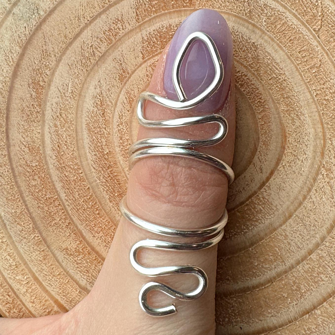 The Serpent snake inspired swan neck ring splint, handmade by Evergreen Ring Splints