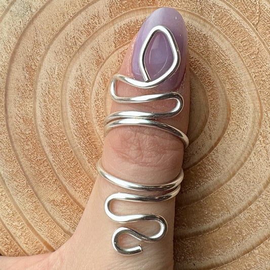 The Serpent snake inspired swan neck ring splint, handmade by Evergreen Ring Splints