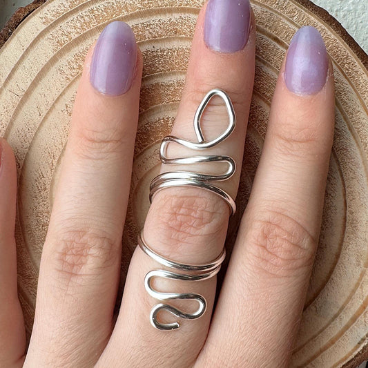 The Serpent snake inspired swan neck ring splint, handmade by Evergreen Ring Splints