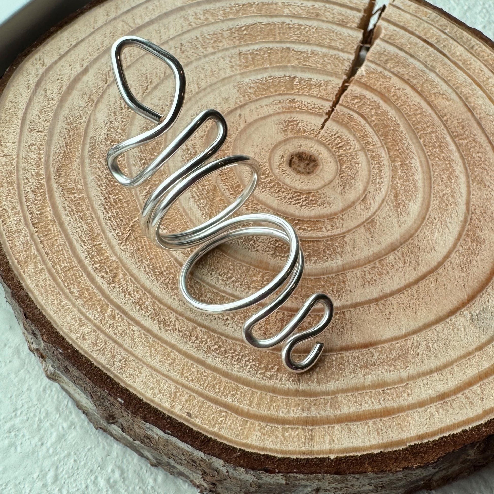 The Serpent snake inspired swan neck ring splint, handmade by Evergreen Ring Splints