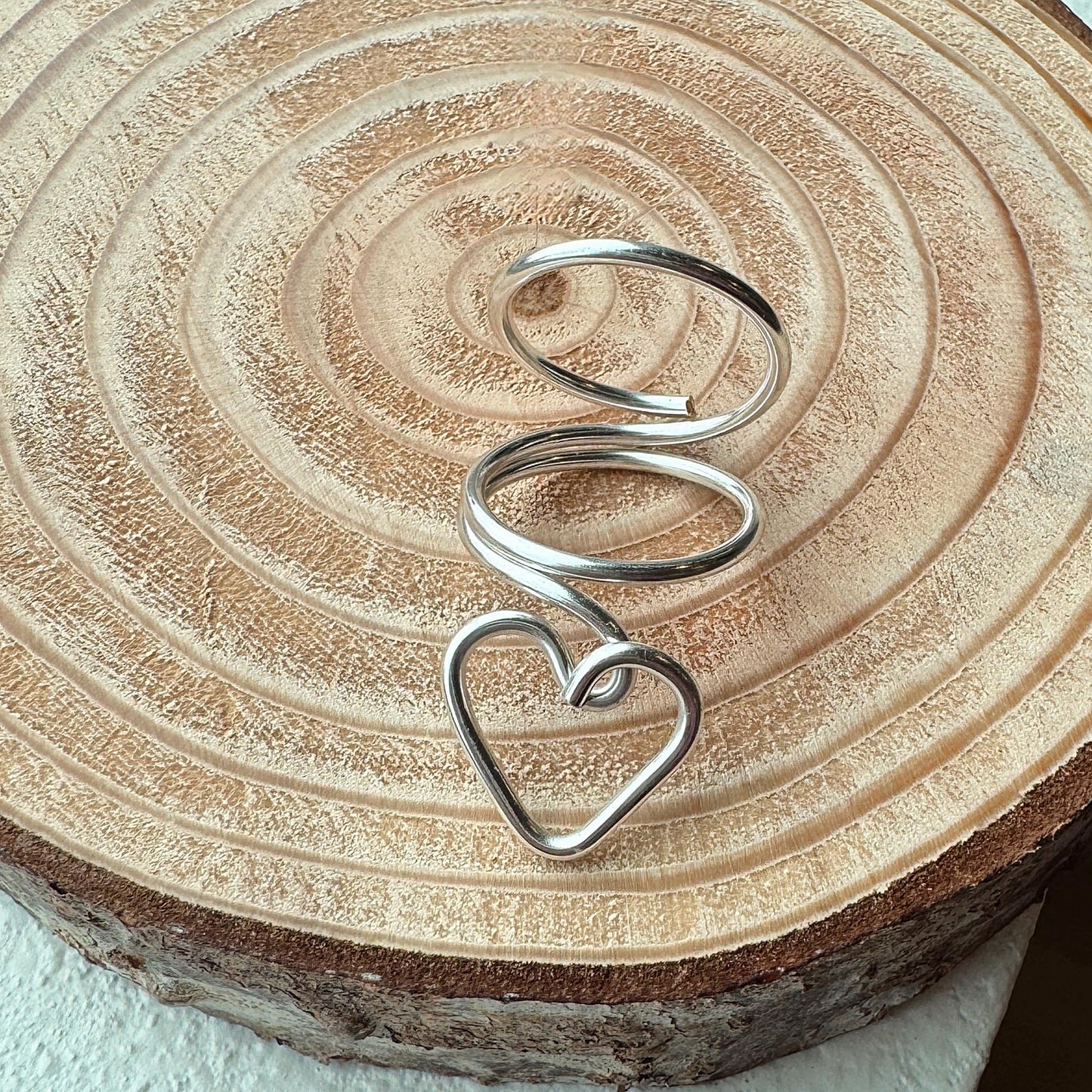 The Sweetheart heart swan neck ring splint, handmade by Evergreen Ring Splints