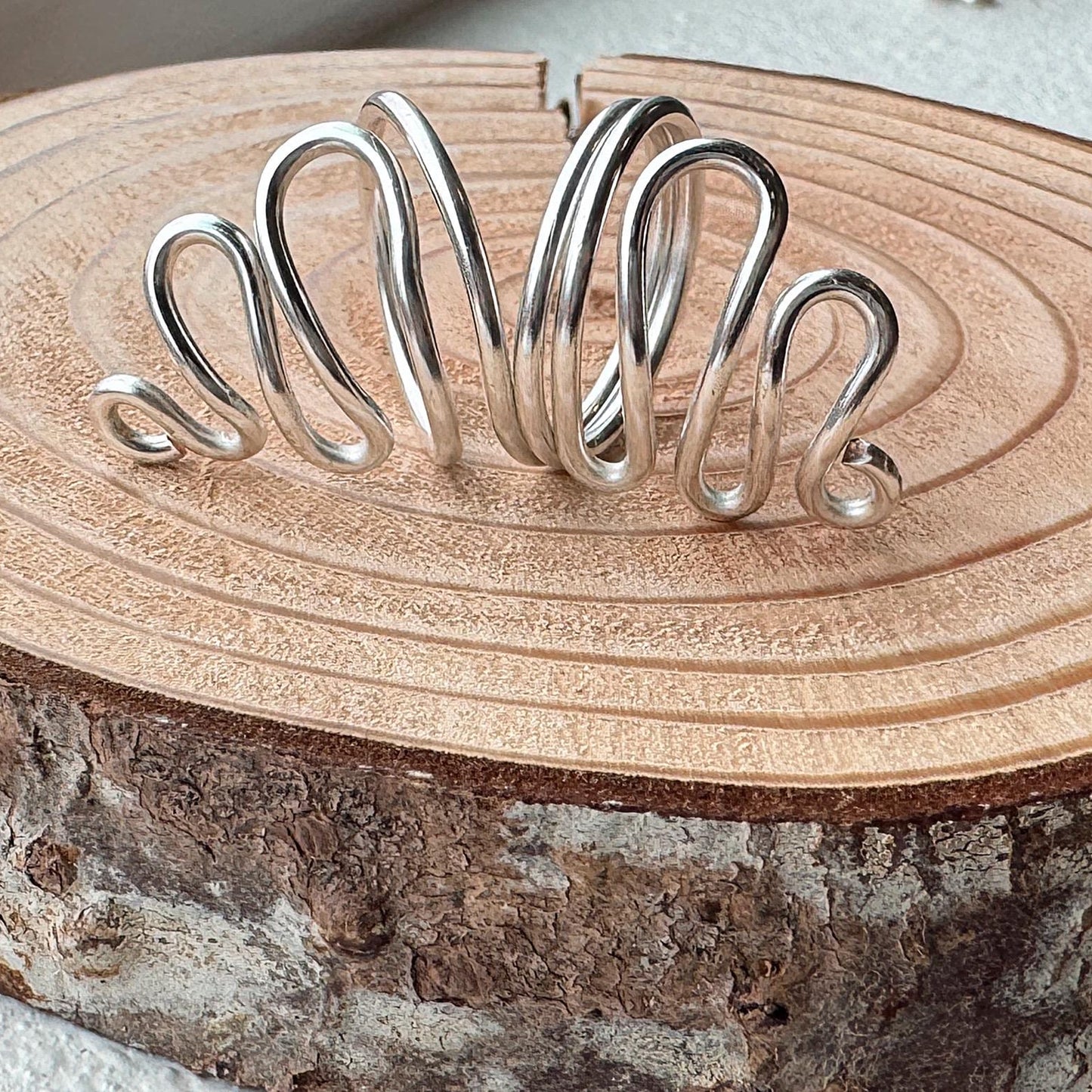 The Willow decorative mallet ring splint, handmade by Evergreen Ring Splints